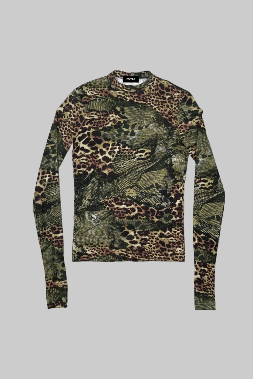 A long-sleeve crewneck shirt featuring an all-over leopard print and camouflage pattern in olive green, brown, black, and beige, laid flat on a white painted wooden background.